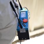 Professional water leak detector using subsurface electro-acoustic instruments to find a water leak in a house property.